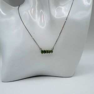 Beautiful Sterling silver pendant with green stones. Brand new